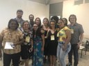 À direita, professores Mônica e Chrisley, na sessão apresentação de sua Comunicação Científica